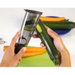 EPLUCHEUR AVEC RESERVOIR